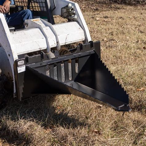 pulling stumps with skid steer|skid steer attachments stump bucket.